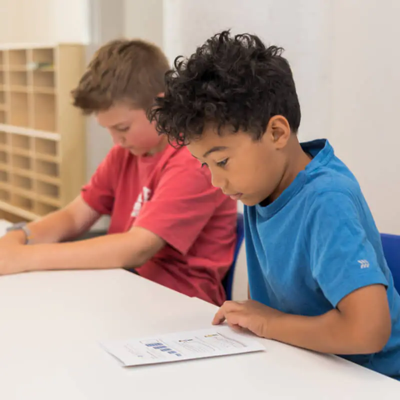 SAM Lincoln Park students completing math worksheets independently in class – photo 08