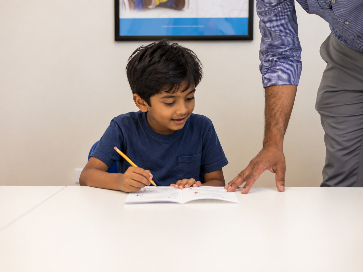 Child working through a Singapore Math problem with a S.A.M coach